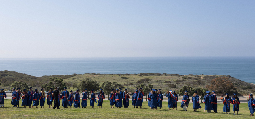 Students graduating outside at Pepperdine