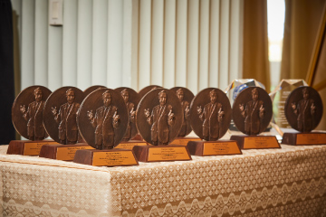 Line up of George Awards trophies