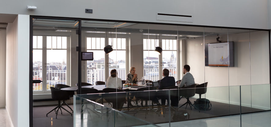 People at table in a meeting