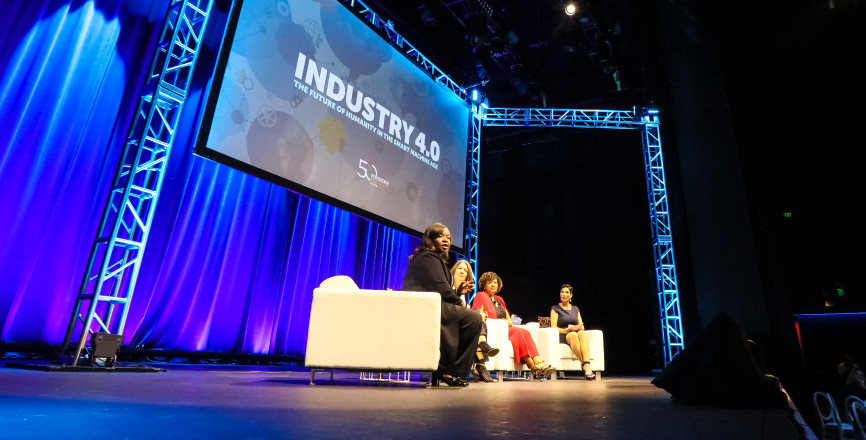 Panelists speaking at LA Live