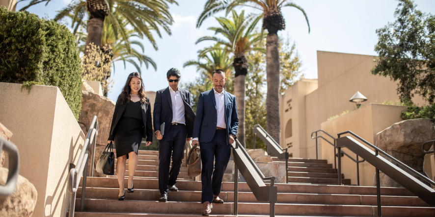 Students and professor walking outside