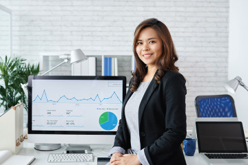 Female Student in Front of Data