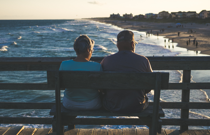 Retired couple looking at the water