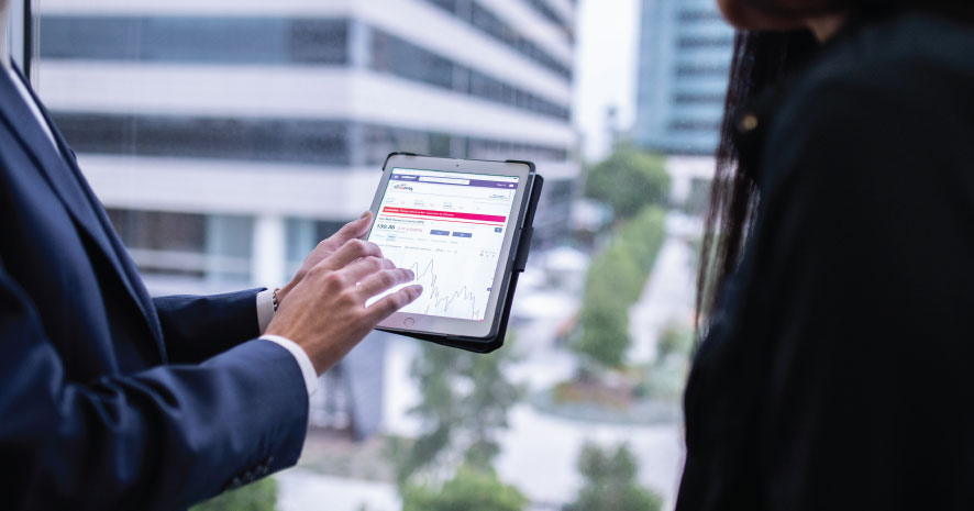 Two People Assessing ROI Chart