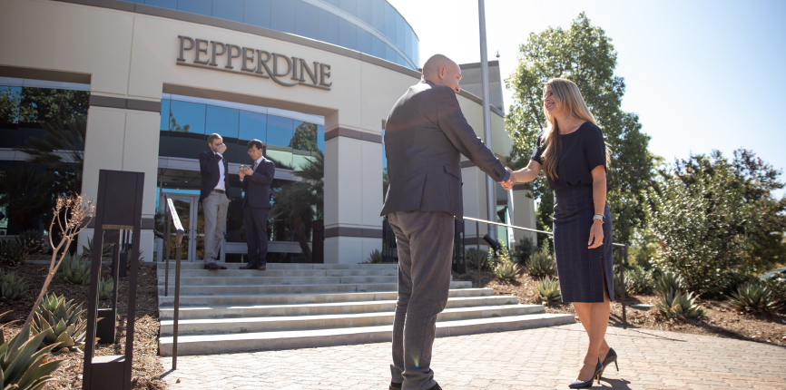 Executive MBA students at Calabasas campus entrance