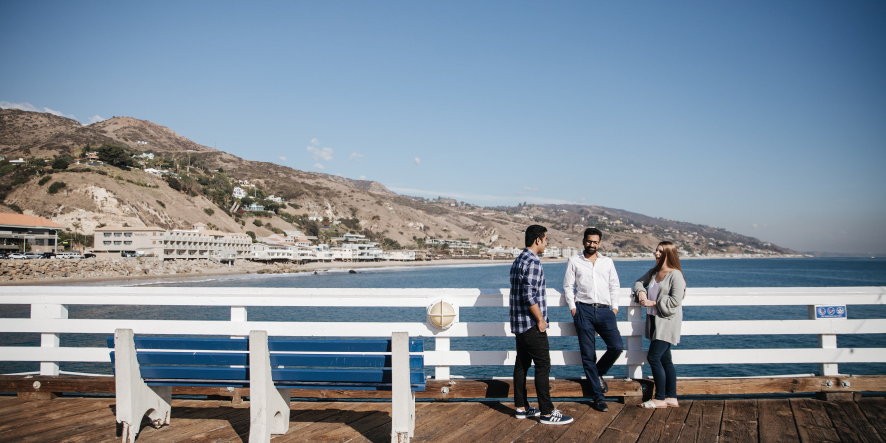 Three students at pier