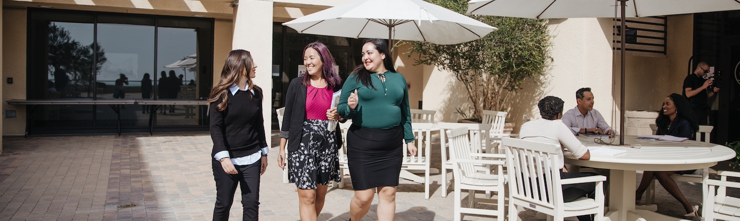 Graziadio business school students walking together on the Malibu campus