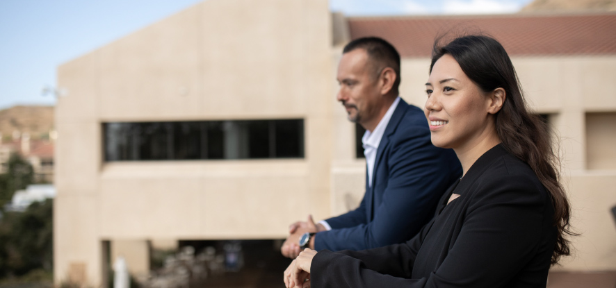 Master's in Business student overlooking ocean