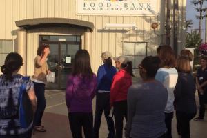 Group shot in front of food bank