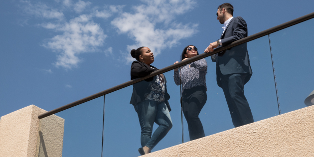 Graziadio students standing and conversing