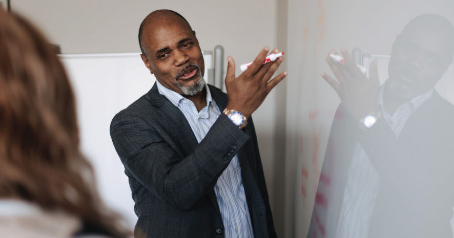 Man at whiteboard