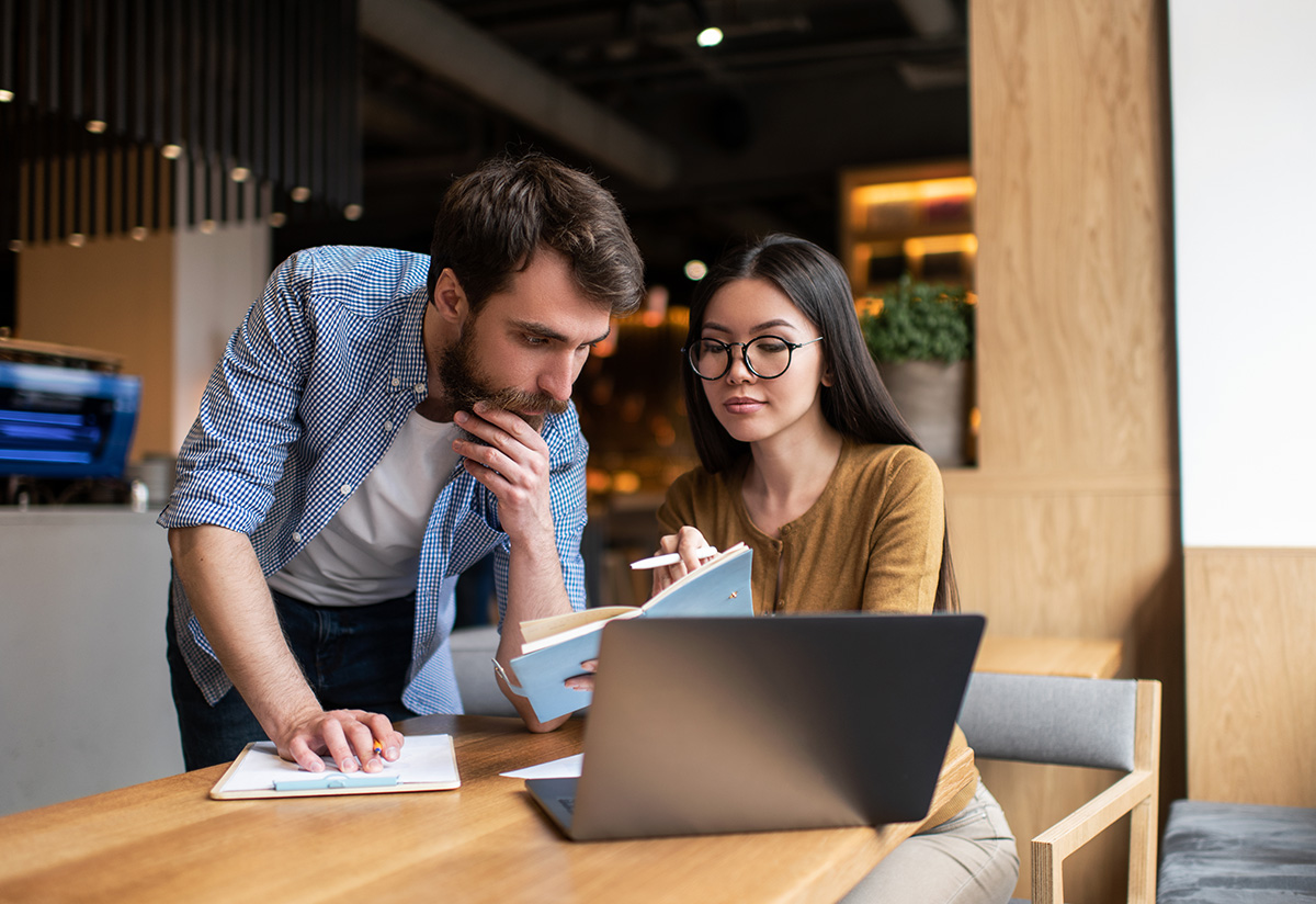 Man and Woman on Laptop