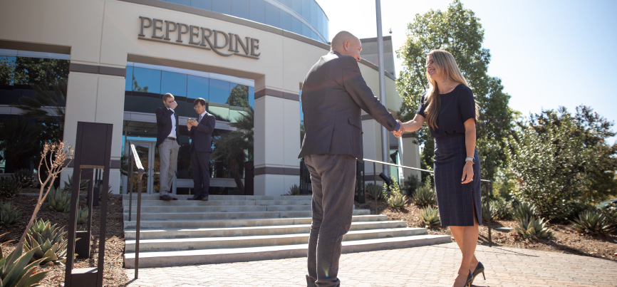 DBA students standing outside Pepperdine Calabasas Campus